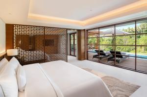 Postel nebo postele na pokoji v ubytování The Westin Resort & Spa Ubud, Bali