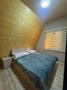 Postel nebo postele na pokoji v ubytování A Frame