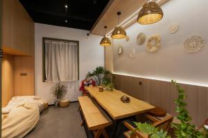 אזור ישיבה ב-Denpa Inn - Disney Kangqiao Branch