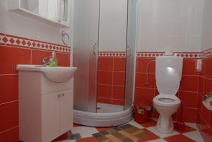 Ένα μπάνιο στο Apartments Dosljak
