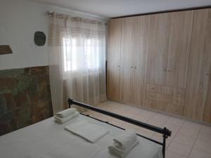 Postel nebo postele na pokoji v ubytování Apalonia + 6 fotografií