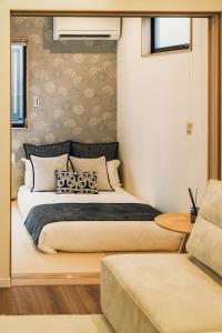 Una cama o camas en una habitación de JS暁宅-静寂 清澄 seijaku seichou