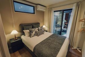 Una cama o camas en una habitación de JS暁宅-静寂 清澄 seijaku seichou