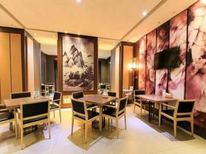 Um restaurante ou outro lugar para comer em Jinjiang Inn Beihai Beibu Gulf Square