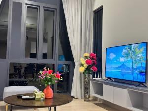 Télévision ou salle de divertissement dans l'établissement Star Residence KLCC By FZB