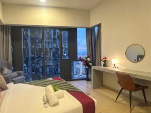 Un ou plusieurs lits dans un hébergement de l'établissement Star Residence KLCC By FZB