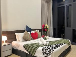 Un ou plusieurs lits dans un hébergement de l'établissement Star Residence KLCC By FZB