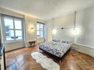 Ένα ή περισσότερα κρεβάτια σε δωμάτιο στο Maison Bardoux #Terrasse#Hypercentre#Parking