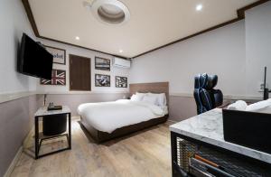 Ssum Hotel Suwon客房内的一张或多张床位