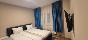 Postel nebo postele na pokoji v ubytování Apartament Sofia