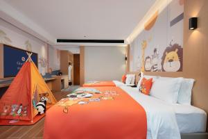 Vuode tai vuoteita majoituspaikassa 滨江万璟酒店 One Gem Hotel