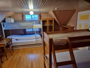 Postel nebo postele na pokoji v ubytování Haugvangen