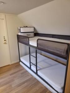 Postel nebo postele na pokoji v ubytování Haugvangen