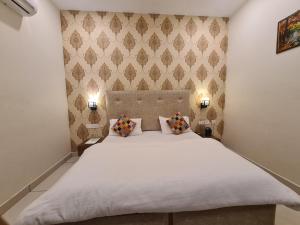 Mahadev Residency客房内的一张或多张床位