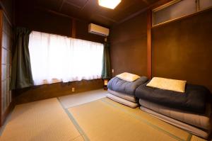 Posezení v ubytování Guesthouse Hatagoya sato 旅籠屋さとう