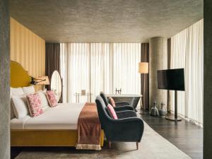 Ένα ή περισσότερα κρεβάτια σε δωμάτιο στο Soho House Istanbul