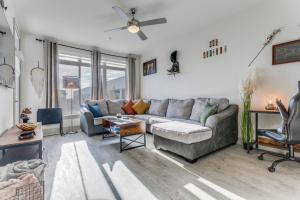 a living room with a couch and a table at San Antonio TX Condo on Riverwalk w King Ste,Pets in San Antonio +28 photos