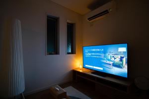Televisor o centre d'entreteniment de 全新三之轮一户建b栋