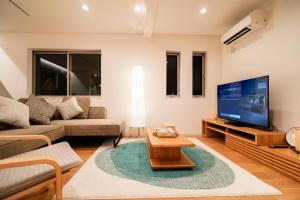 Televisor o centre d'entreteniment de 全新三之轮一户建b栋