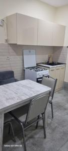 Kuchyň nebo kuchyňský kout v ubytování Destinyplace + 6 fotografií