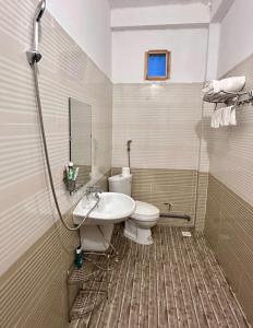 Koupelna v ubytování Homestay Núi Đá Tả Phìn