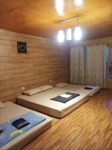 Katil atau katil-katil dalam bilik di Villa Laurdes