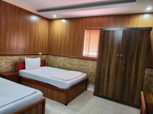 Postel nebo postele na pokoji v ubytování Quỳnh Vy Hotel Thái Nguyên
