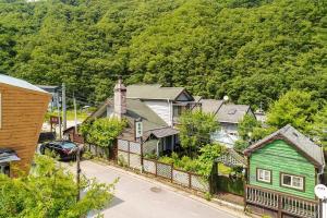 an aerial view of a small town with houses at Gapyeong Green Star Pension Remodeling, Spa in Gapyeong