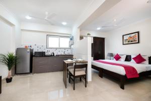 Kuchyň nebo kuchyňský kout v ubytování Palm Stay - Studios & Rooms