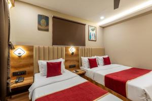 Postel nebo postele na pokoji v ubytování Hotel Zara International