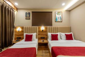 Postel nebo postele na pokoji v ubytování Hotel Zara International