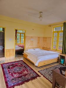 Postel nebo postele na pokoji v ubytování Hotel Dhungri valley