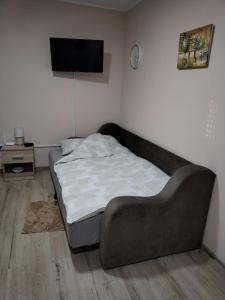 A bed or beds in a room at Studio Lejla