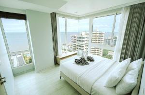 Postel nebo postele na pokoji v ubytování Veranda Residences Pattaya By Phung + 37 fotografií