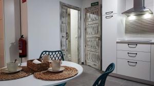 Una cocina o zona de cocina en Alojamientos Rurales Las Candelas