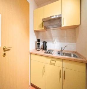 Kuchyň nebo kuchyňský kout v ubytování Haus Flora