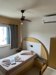 Rúm í herbergi á HOTEL LAREIRA