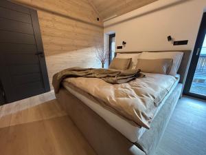 Postel nebo postele na pokoji v ubytování Apartmány Dolina