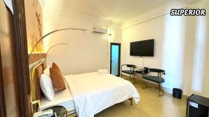 TV a/nebo společenská místnost v ubytování Hạnh Phúc Hotel