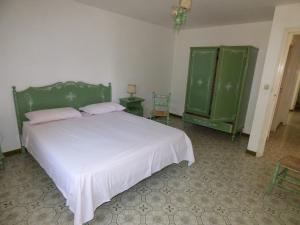 Postel nebo postele na pokoji v ubytování Villa L'isola