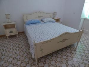 Postel nebo postele na pokoji v ubytování Villa L'isola