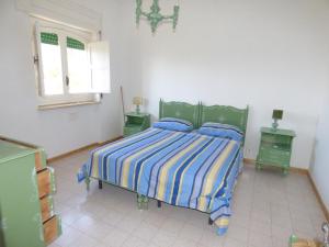 Postel nebo postele na pokoji v ubytování Villa L'isola