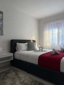 Ένα ή περισσότερα κρεβάτια σε δωμάτιο στο Green Oasis