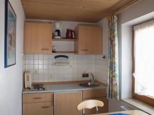 Kuchyň nebo kuchyňský kout v ubytování Gästehaus Böck