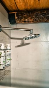 a light hanging from a ceiling in a room at cabaña la olivia in Lunlunta +4 photos