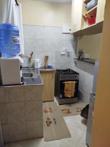 Kuchyň nebo kuchyňský kout v ubytování Two Bedroom Thika Town