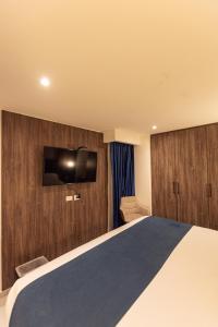 TV a/nebo společenská místnost v ubytování Zi One Luxury Hotel