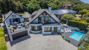 an overhead view of a house with a swimming pool at Cloverleigh Guest House in Wilderness +37 photos