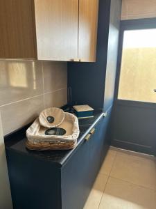 Η κουζίνα ή μικρή κουζίνα στο Alamitos Departamentos Boutique