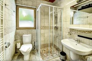 Koupelna v ubytování Chalet Dacha mit finnischer Sauna